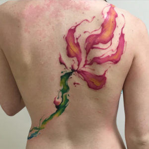 Burning Flower Tattoo on back
